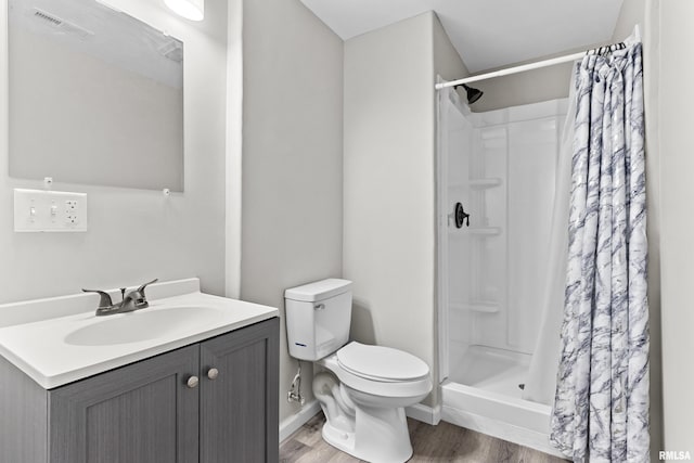 1604 Savile Ln, Washington, IL 61571 - bathroom with wood finished floors, vanity, and a shower with shower curtain