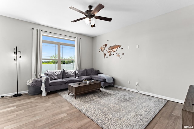 1604 Savile Ln, Washington, IL 61571 - living area featuring light wood finished floors and ceiling fan
