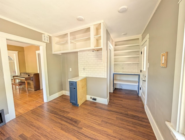 1101 S 4th St, Pekin, IL 61554 - interior space with blue cabinets, ornamental molding, dark wood finished floors, backsplash, and open shelves