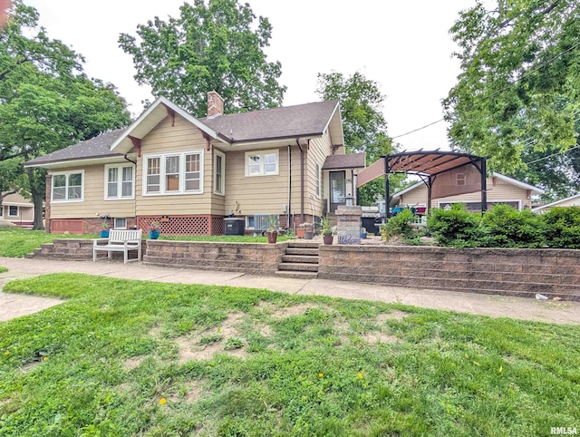 1101 S 4th St, Pekin, IL 61554 - rear view of house featuring a chimney, a yard, and a pergola