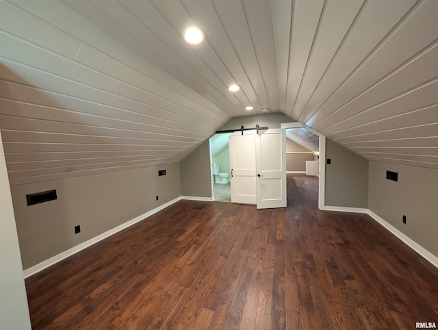1101 S 4th St, Pekin, IL 61554 - additional living space featuring lofted ceiling, dark wood-style floors, a barn door, and recessed lighting