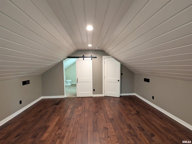1101 S 4th St, Pekin, IL 61554 - additional living space featuring vaulted ceiling, dark wood finished floors, a barn door, and recessed lighting