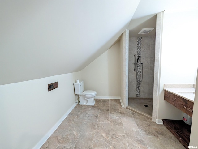 1101 S 4th St, Pekin, IL 61554 - bathroom featuring a tile shower, lofted ceiling, and vanity