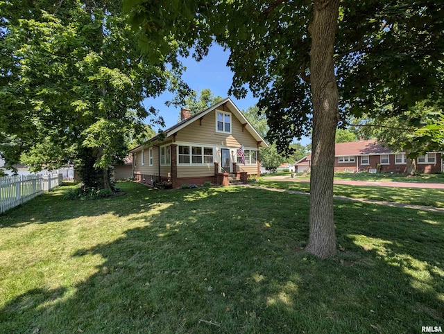 1101 S 4th St, Pekin, IL 61554 - view of front of house with a chimney