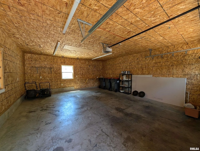 1101 S 4th St, Pekin, IL 61554 - garage featuring a garage door opener
