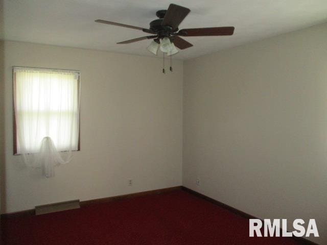 1265 Spring Bay Rd, East Peoria, IL 61611 - unfurnished room featuring a ceiling fan