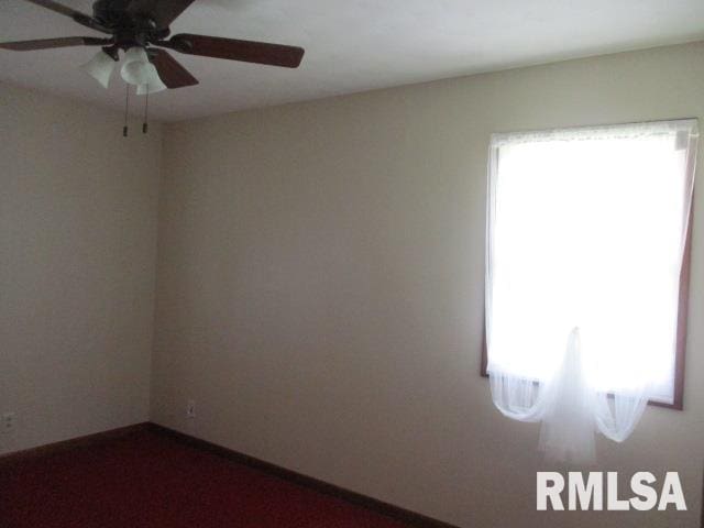 1265 Spring Bay Rd, East Peoria, IL 61611 - empty room featuring ceiling fan