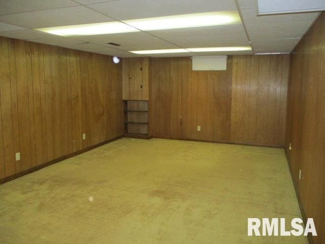 1265 Spring Bay Rd, East Peoria, IL 61611 - finished below grade area featuring wooden walls and light colored carpet
