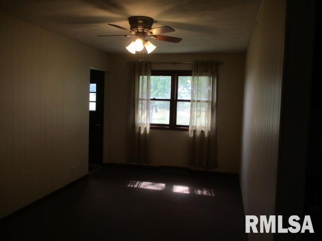 1265 Spring Bay Rd, East Peoria, IL 61611 - spare room with a ceiling fan