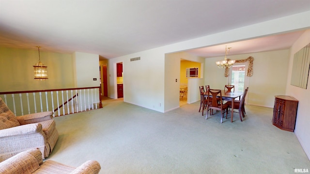 1729 W Willow Wood Dr, Peoria, IL 61614 - living area featuring a chandelier and light colored carpet