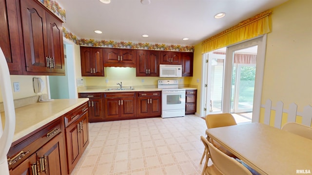 1729 W Willow Wood Dr, Peoria, IL 61614 - kitchen with white appliances, light countertops, light flooring, and recessed lighting