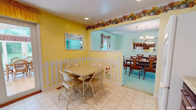 1729 W Willow Wood Dr, Peoria, IL 61614 - dining room featuring a chandelier and recessed lighting