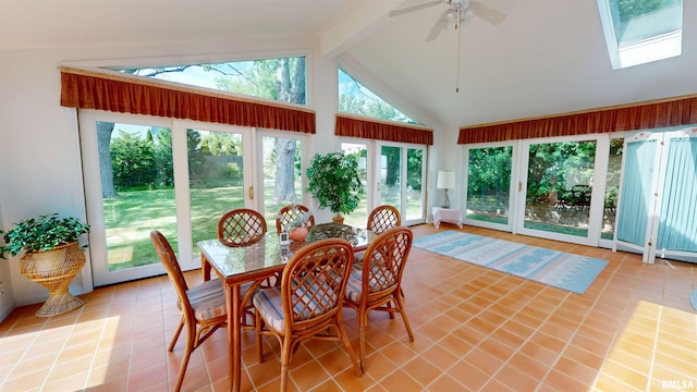 1729 W Willow Wood Dr, Peoria, IL 61614 - sunroom with french doors, plenty of natural light, beamed ceiling, high vaulted ceiling, and tile patterned flooring