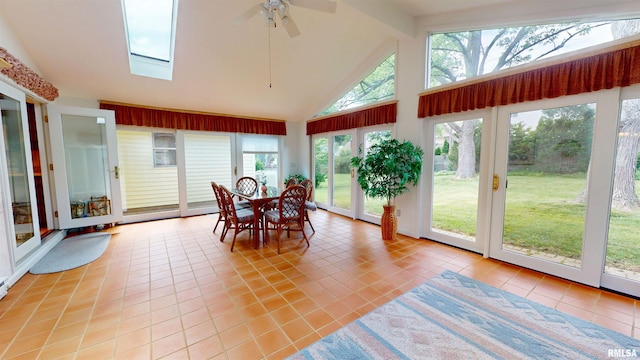 1729 W Willow Wood Dr, Peoria, IL 61614 - sunroom with tile patterned flooring, a skylight, high vaulted ceiling, and beam ceiling
