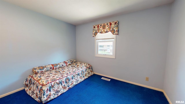 1729 W Willow Wood Dr, Peoria, IL 61614 - carpeted bedroom featuring baseboards