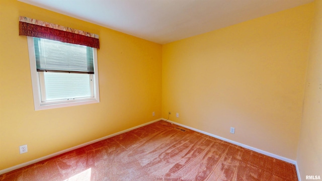 1729 W Willow Wood Dr, Peoria, IL 61614 - unfurnished room featuring carpet floors and baseboards