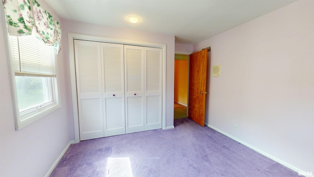 1729 W Willow Wood Dr, Peoria, IL 61614 - unfurnished bedroom with carpet floors and a closet