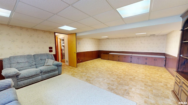 1729 W Willow Wood Dr, Peoria, IL 61614 - living room featuring wallpapered walls, wainscoting, and a drop ceiling