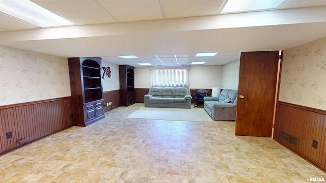 1729 W Willow Wood Dr, Peoria, IL 61614 - living room featuring a wainscoted wall and wallpapered walls