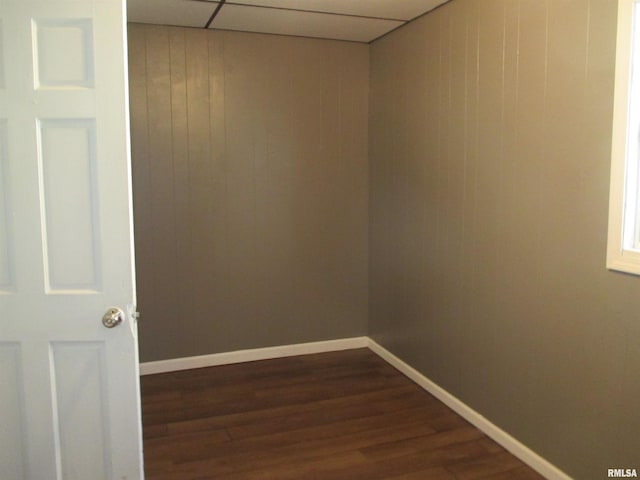 1810 W Latrobe St, Peoria, IL 61605 - empty room featuring dark wood-type flooring and a paneled ceiling