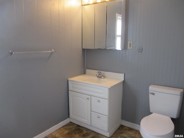 1810 W Latrobe St, Peoria, IL 61605 - half bathroom featuring vanity and toilet