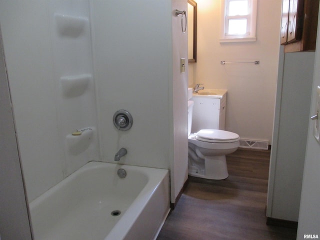 1810 W Latrobe St, Peoria, IL 61605 - full bathroom with wood finished floors, vanity, and washtub / shower combination