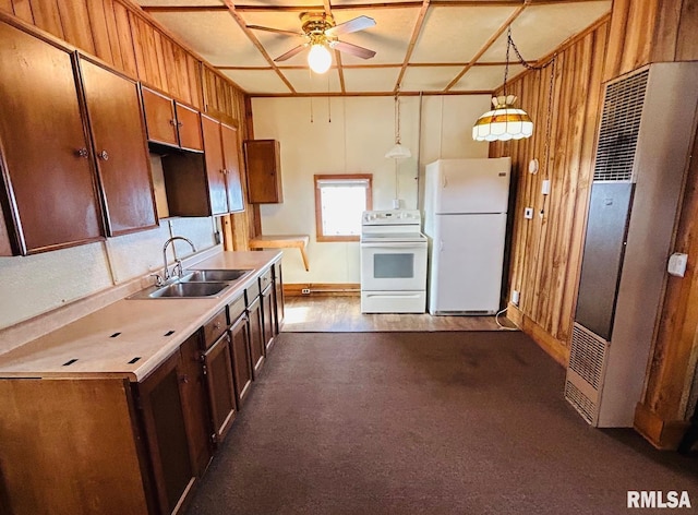 1305 S 8th St, Pekin, IL 61554 - kitchen featuring white appliances, ceiling fan, a heating unit, light countertops, and decorative light fixtures