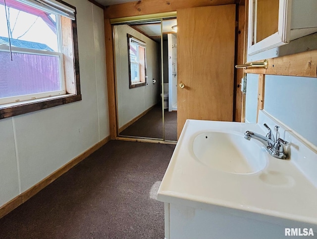 1305 S 8th St, Pekin, IL 61554 - bathroom with vanity and baseboards