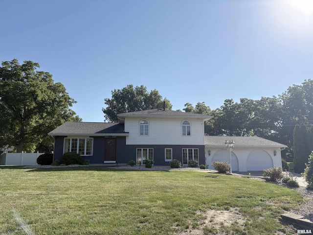 276 E Far Hills Dr, East Peoria, IL 61611 - tri-level home featuring an attached garage