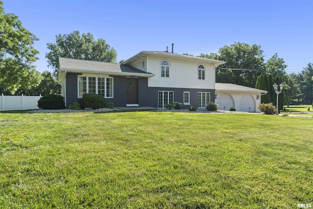 276 E Far Hills Dr, East Peoria, IL 61611 - tri-level home featuring a garage