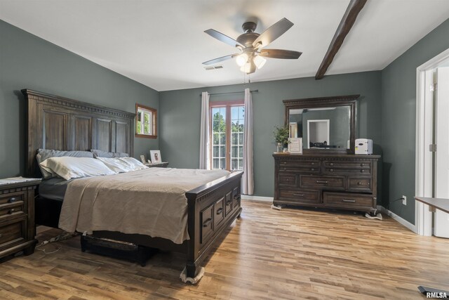 276 E Far Hills Dr, East Peoria, IL 61611 - bedroom featuring light wood finished floors and a ceiling fan