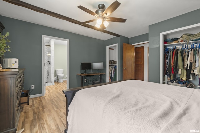 276 E Far Hills Dr, East Peoria, IL 61611 - bedroom featuring wood finished floors, connected bathroom, and ceiling fan