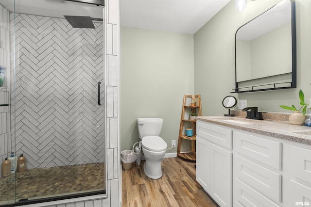276 E Far Hills Dr, East Peoria, IL 61611 - full bathroom with vanity, a stall shower, and wood finished floors