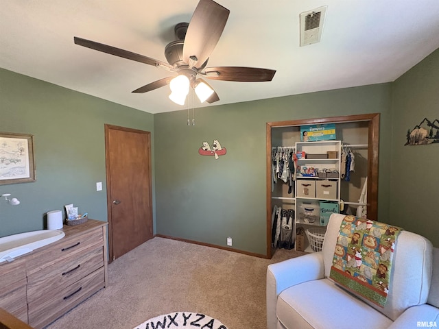 276 E Far Hills Dr, East Peoria, IL 61611 - sitting room featuring a ceiling fan and carpet