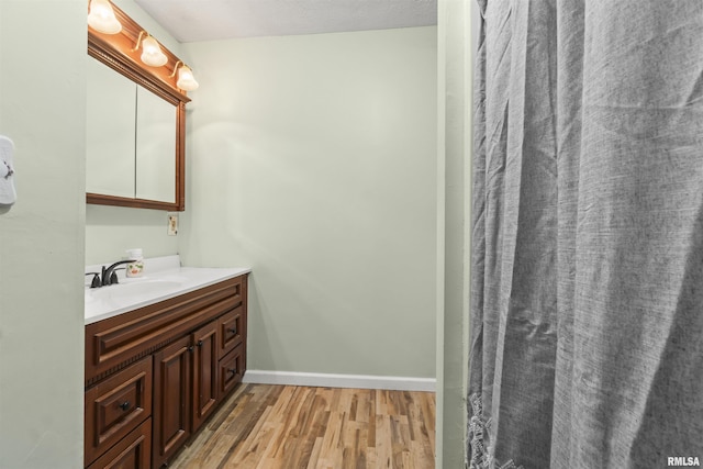 276 E Far Hills Dr, East Peoria, IL 61611 - full bathroom featuring wood finished floors and vanity