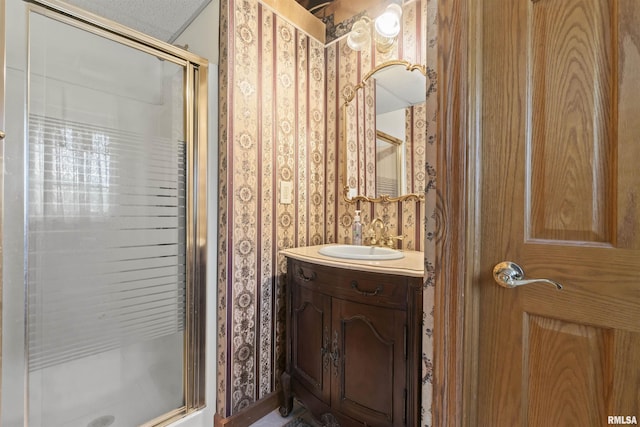 276 E Far Hills Dr, East Peoria, IL 61611 - full bath with a shower stall, vanity, and wallpapered walls