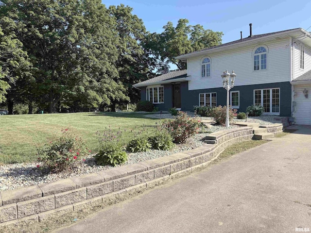 276 E Far Hills Dr, East Peoria, IL 61611 - view of front of house featuring a front lawn