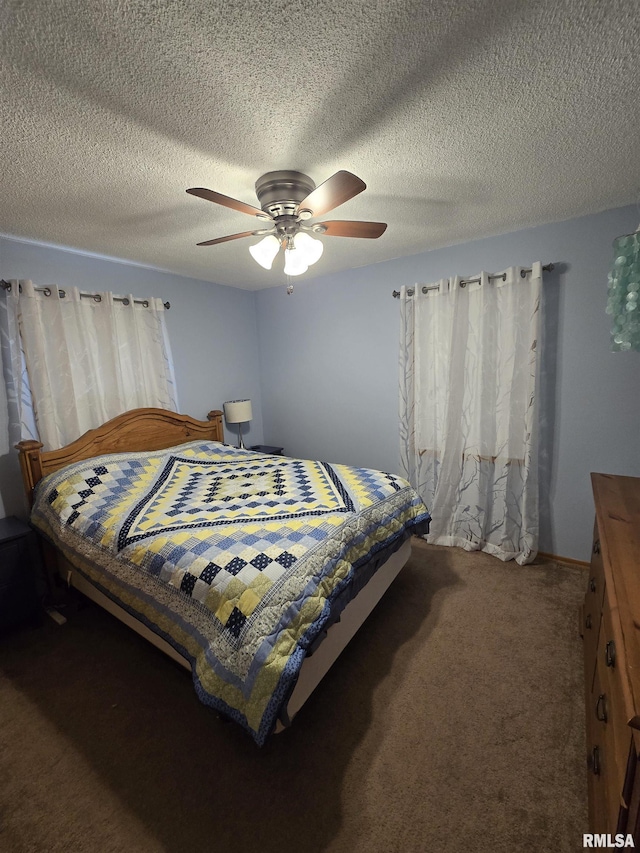 1515 Lakeview Rd N, Dahinda, IL 61428 - bedroom featuring carpet, a ceiling fan, and a textured ceiling