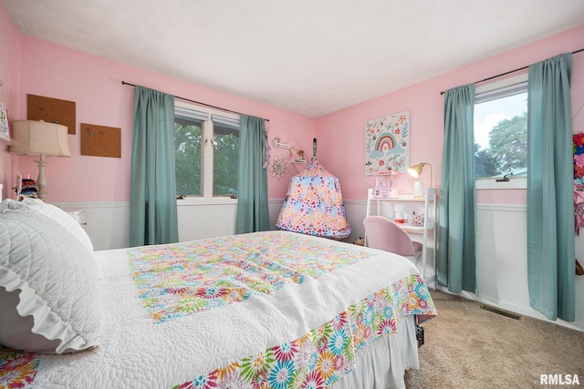 114 Julian Ave, East Peoria, IL 61611 - bedroom featuring multiple windows and carpet flooring