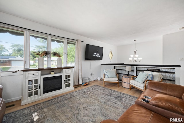 114 Julian Ave, East Peoria, IL 61611 - living room with a chandelier and wood finished floors