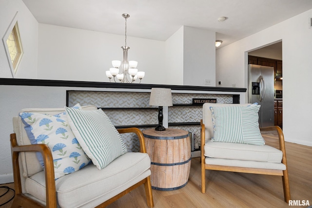 114 Julian Ave, East Peoria, IL 61611 - sitting room featuring light wood-style floors and a chandelier