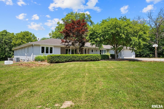 22475 N Main St, Morton, IL 61550 - ranch-style home featuring driveway, a front yard, and a garage