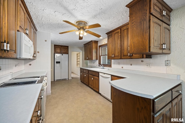 22475 N Main St, Morton, IL 61550 - kitchen featuring white appliances, a ceiling fan, light countertops, a textured ceiling, and decorative backsplash