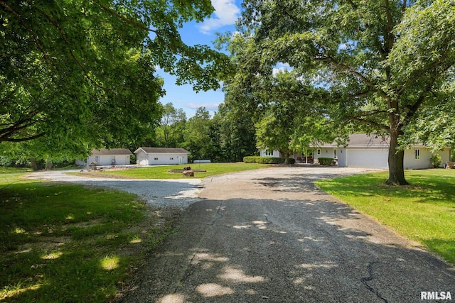 22475 N Main St, Morton, IL 61550 - view of front facade with asphalt driveway and a front yard