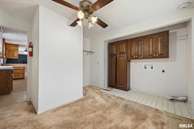 22475 N Main St, Morton, IL 61550 - laundry room featuring hookup for an electric dryer, cabinet space, hookup for a washing machine, ceiling fan, and light colored carpet