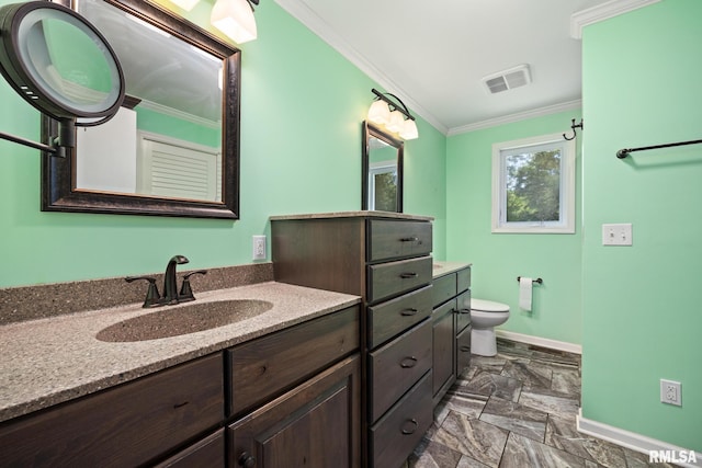 22475 N Main St, Morton, IL 61550 - bathroom featuring vanity, crown molding, and stone finish flooring