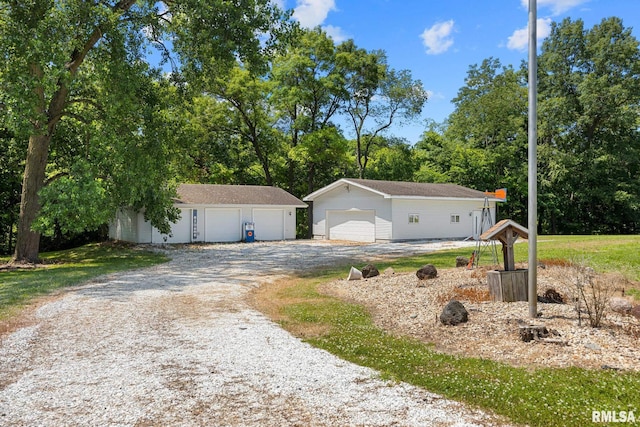 22475 N Main St, Morton, IL 61550 - ranch-style house featuring an outbuilding and a garage