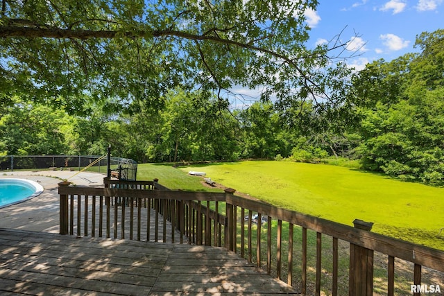22475 N Main St, Morton, IL 61550 - deck featuring a lawn, view of scattered trees, and a patio