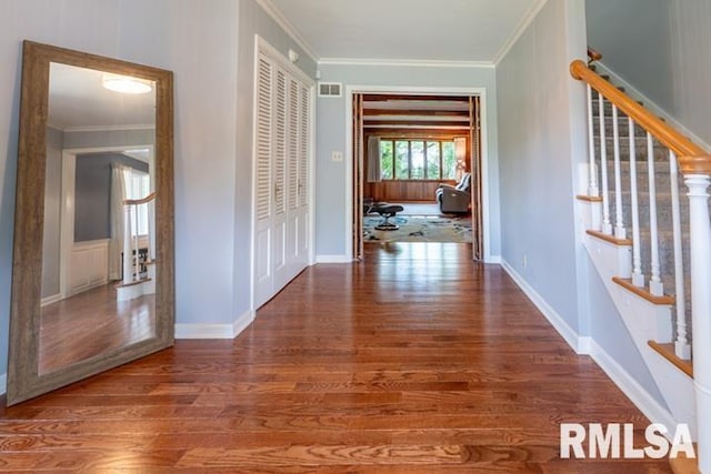 210 W Wolf Rd, Peoria, IL 61614 - hallway with ornamental molding, wood finished floors, and stairs