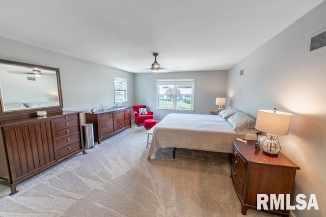 210 W Wolf Rd, Peoria, IL 61614 - bedroom featuring light colored carpet and a ceiling fan